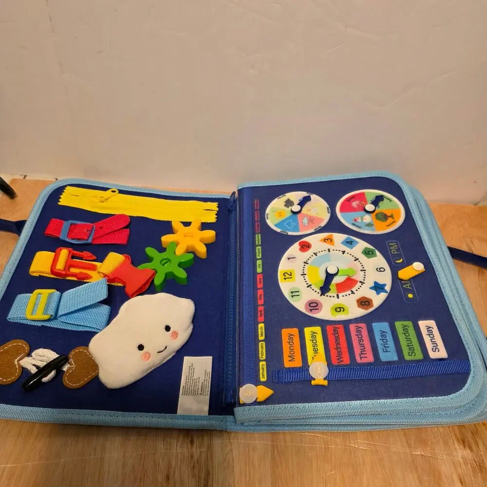 Esjay Toddler Busy Board in a portable dinosaur-themed felt carry case